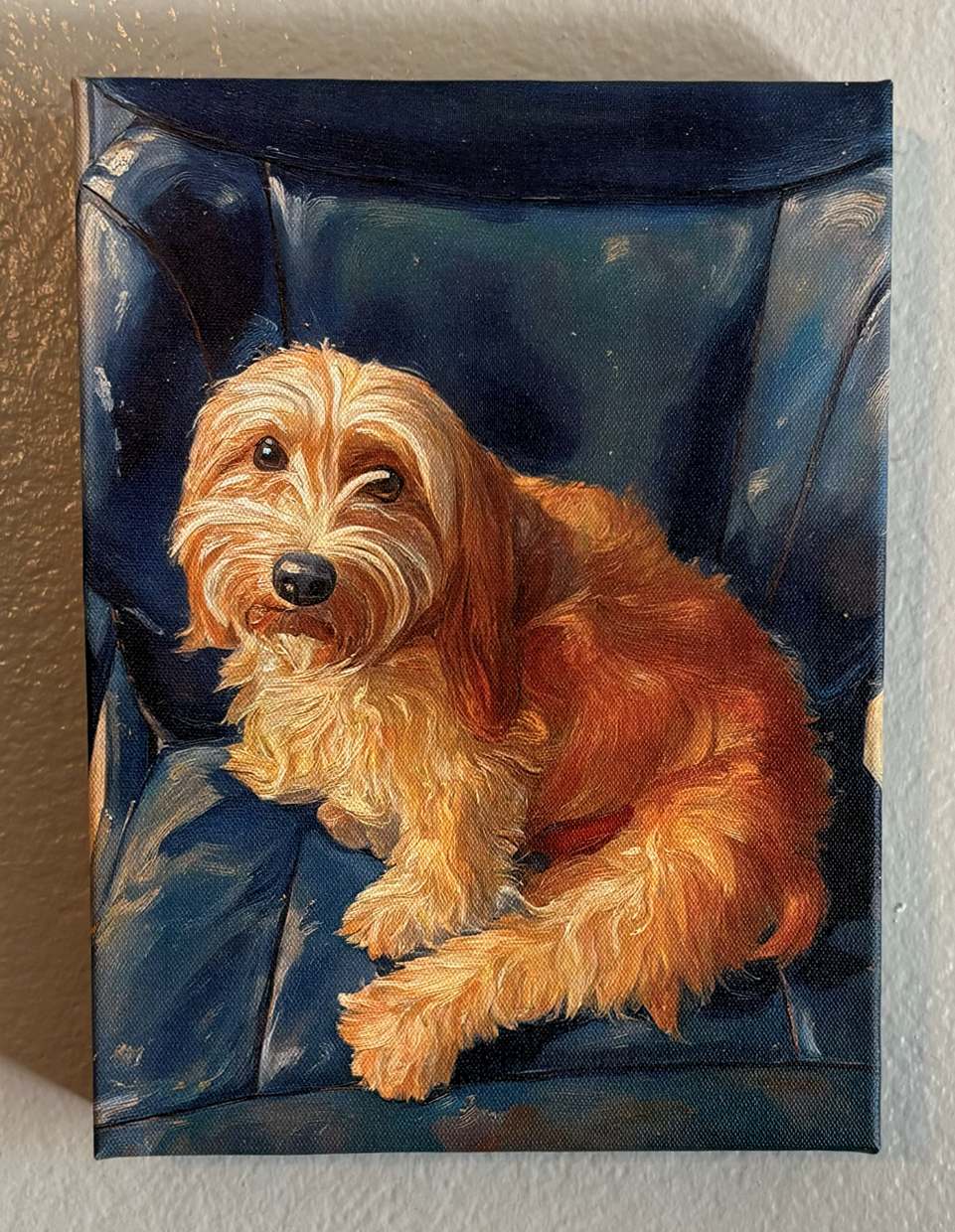 A real printed canvas of the dog artwork, hanging on a wall